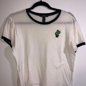White shirt with a cactus detail